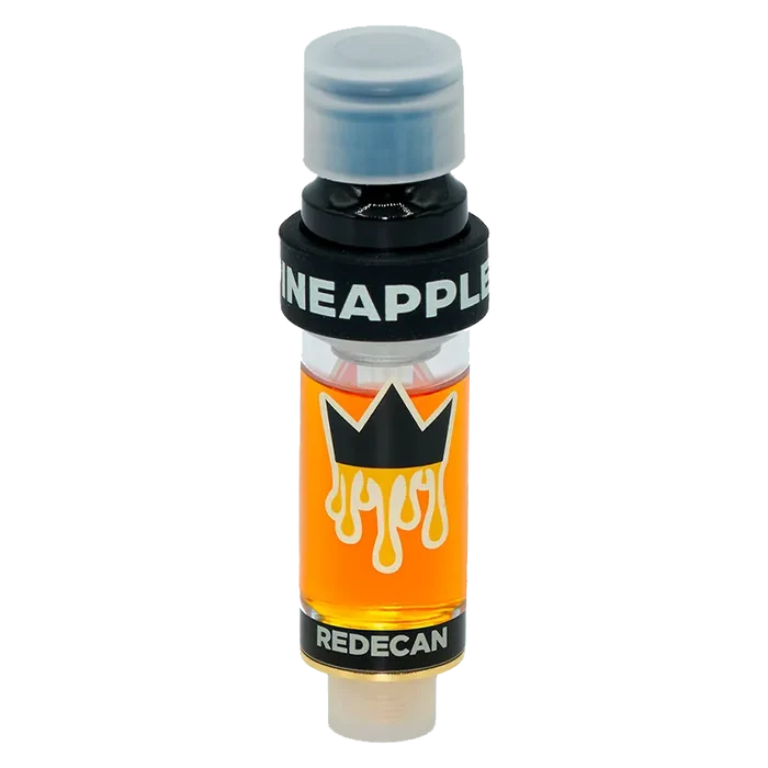 Centered upright against a white background, the Amped Live Resin Pineapple Express Vape Cartridge shows its clear glass chamber of amber oil, black crown logo, and bold "PINEAPPLE" band.