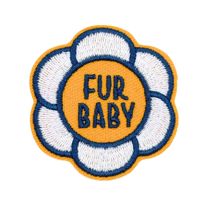 Embroidered patch with 'Fur Baby' text in the center on a white background