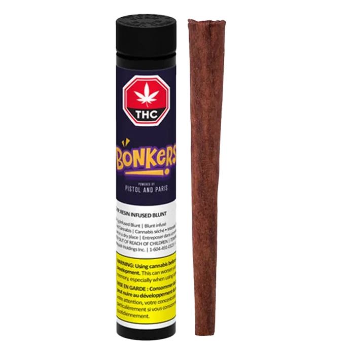 Straight-on view of an upright O.P.P. Resin Infused Blunt PR 1 x 1 g tube with purple label beside a single brown blunt.