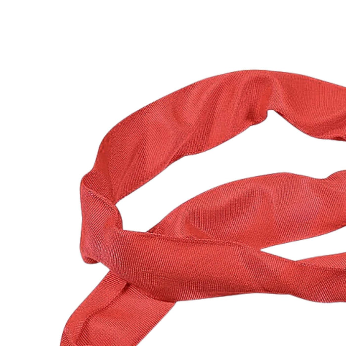 Red endless loop lifting sling close up of polyester jacket.